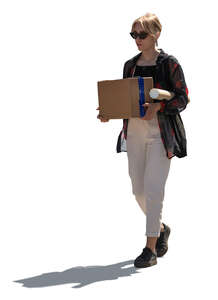 cut out backlit woman carrying a box