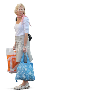 woman standing with two bags in her hands