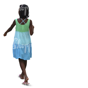 young black girl in a summer dress walking