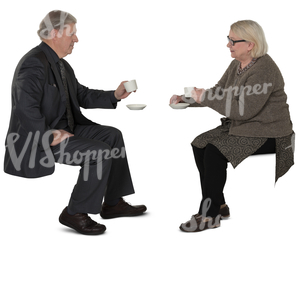 elderly couple sitting in a cafe and drinking coffee