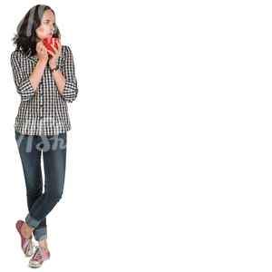 woman standing in a room and drinking coffee