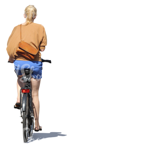 woman riding a bike in the summertime