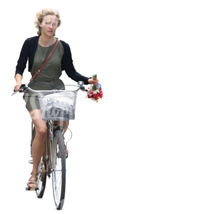 woman riding a bicycle with flowers in her hand