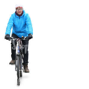 man in a blue jacket riding a bike