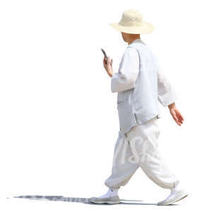 asian man wearing white blouse and trousers walking