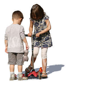 boy and girl playing together with a scooter