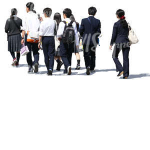 group of asian schoolchildren walking on the street