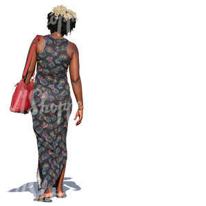 cut out african woman in a long dress walking