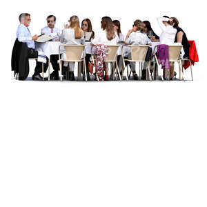 big group of people sitting in a cafe