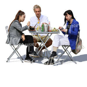 three people sitting in a cafe and eating