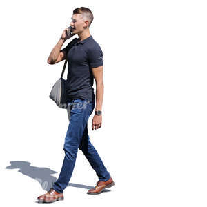 man walking and talking on a phone