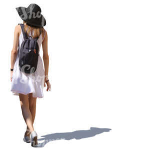 woman in a white summer dress walking