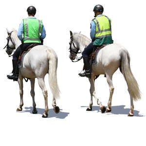 two mounted police officers riding