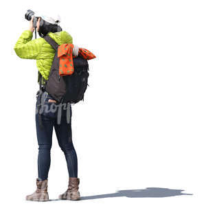 asian woman with a backpack taking a picture