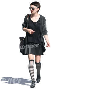 cut out woman in a black outfit walking