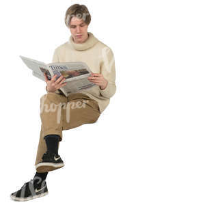 young man sitting and reading a newspaper