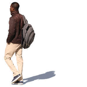 african man with a backpack walking