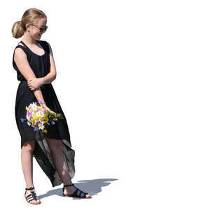 teenage girl with a bouquet of flowers standing