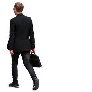 young businessman with a laptop bag walking