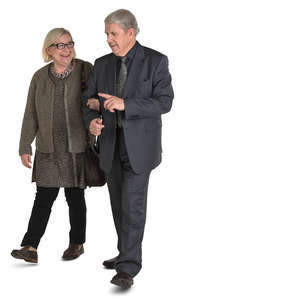 older couple walking arm in arm