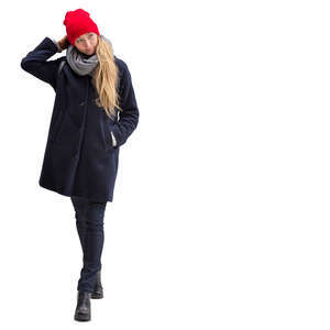 woman with a red winter hat walking