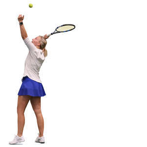 woman serving while playing tennis