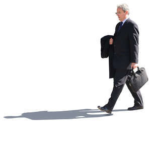 senior businessman walking on the street