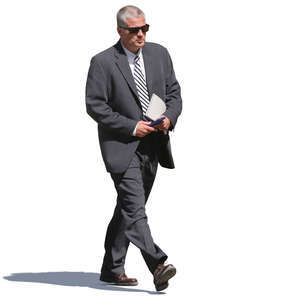 businessman with a striped tie walking