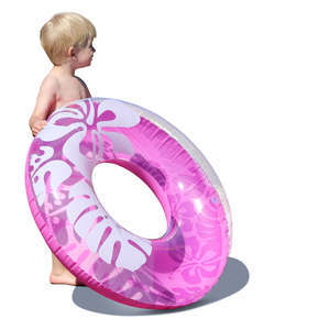 little boy with a swim ring standing in sunlight