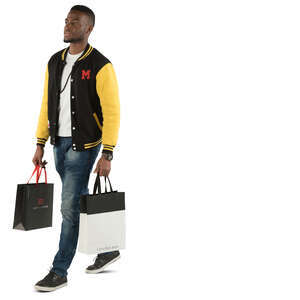 black man with shopping bags walking
