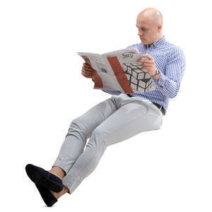 man sitting and reading a newspaper