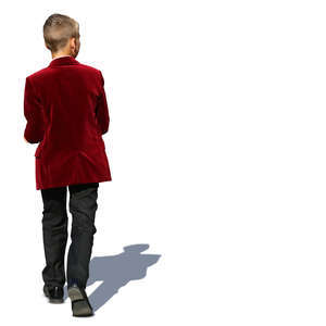 little boy in a formal velvet jacket walking