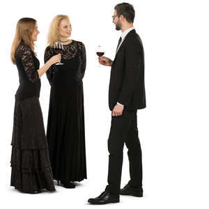 group of three people at a formal gathering standing and talking