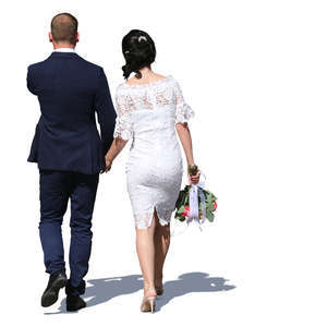 couple in formal clothes walking hand in hand