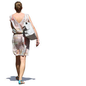 woman in a summer dress walking