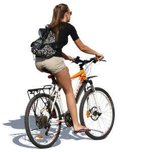 woman riding a bicycle in the summer