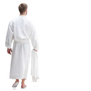 man in a bathrobe walking seen from back