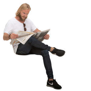 man sitting and reading a newspaper