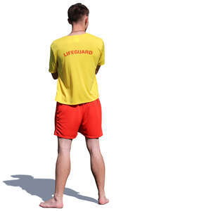 lifeguard standing on the beach