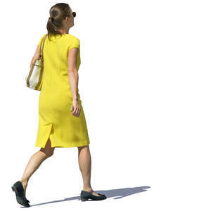 woman in a yellow dress walking