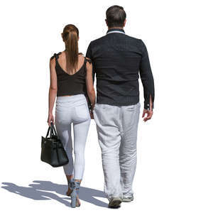 man and woman in black and white walking hand in hand