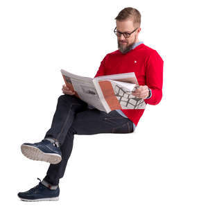 man in a red sweater sitting and reading
