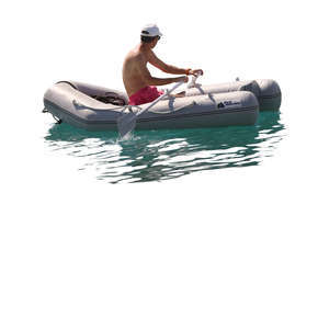 man rowing an inflatable boat