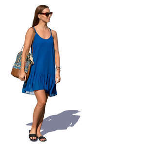 woman in a blue summer dress walking