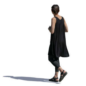 woman in a black summer dress walking