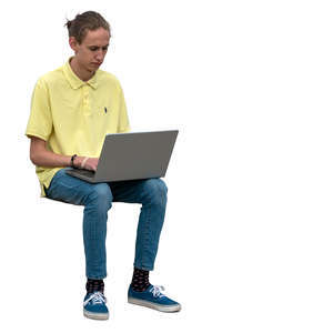 man sitting and working with laptop