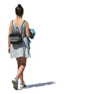 woman in a grey summer dress walking