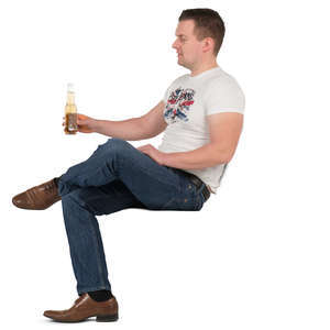 man sitting and drinking beer