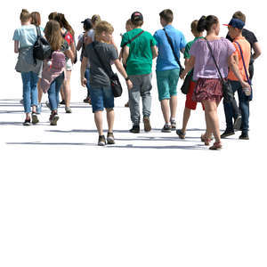 group of young people walking in the summer