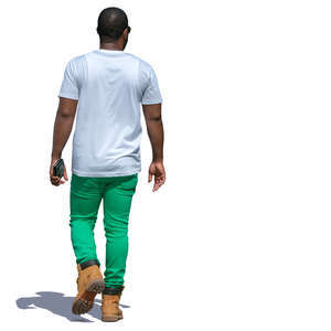 black man in green pants walking